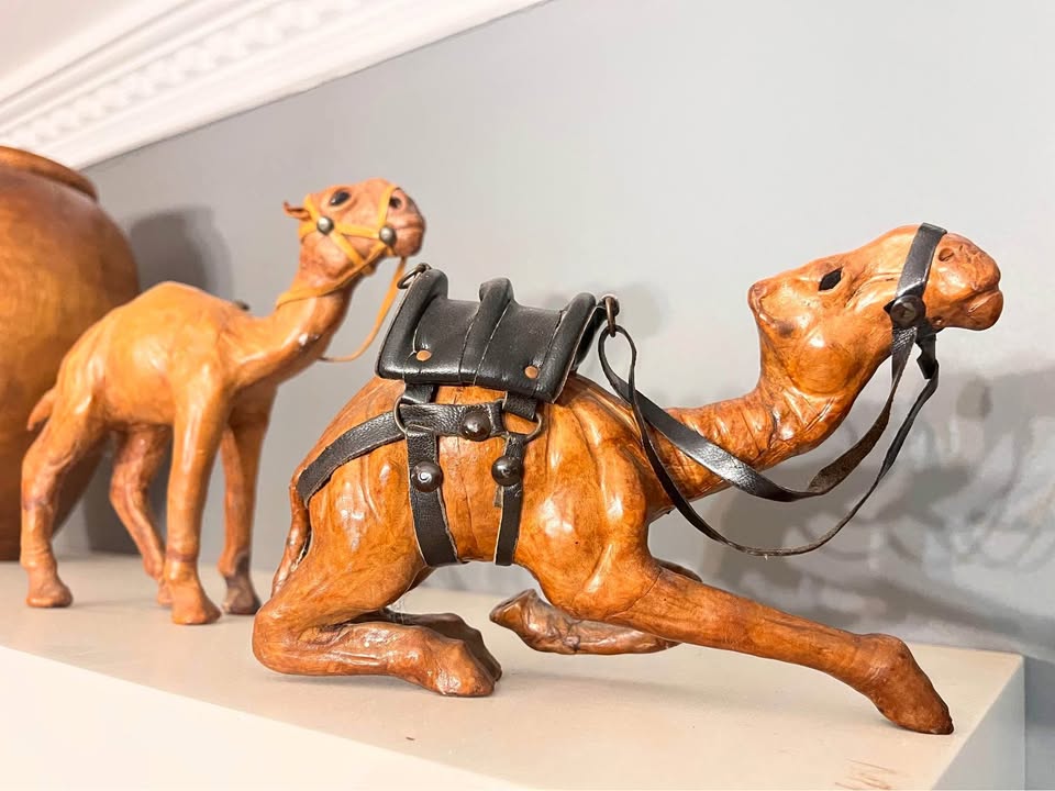 Two small leather camels