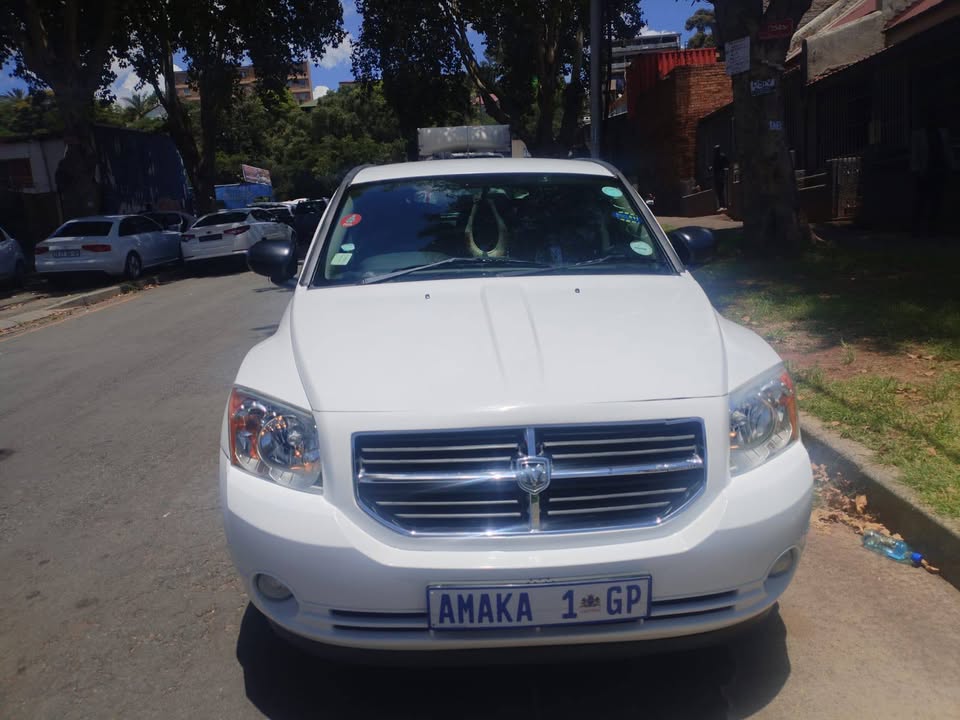 2012 DODGE CALIBER SXT 2.0 Petrol, Manual, White Color, Mileage 102000kms