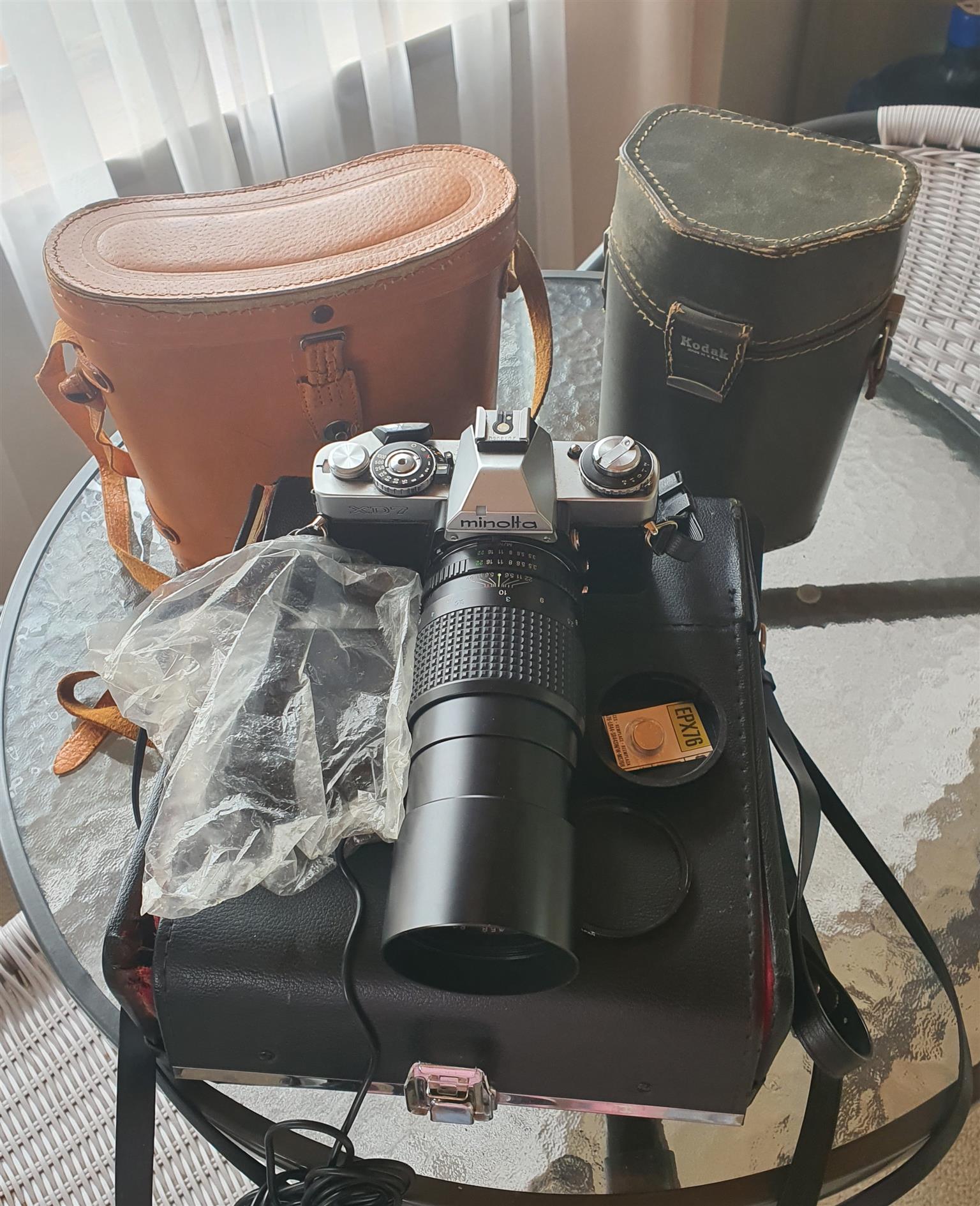 Combo. Vintage binoculars minolta xd7 camera and kodak camera Combo. Vintage binoculars minolta xd7 camera and kodak camera