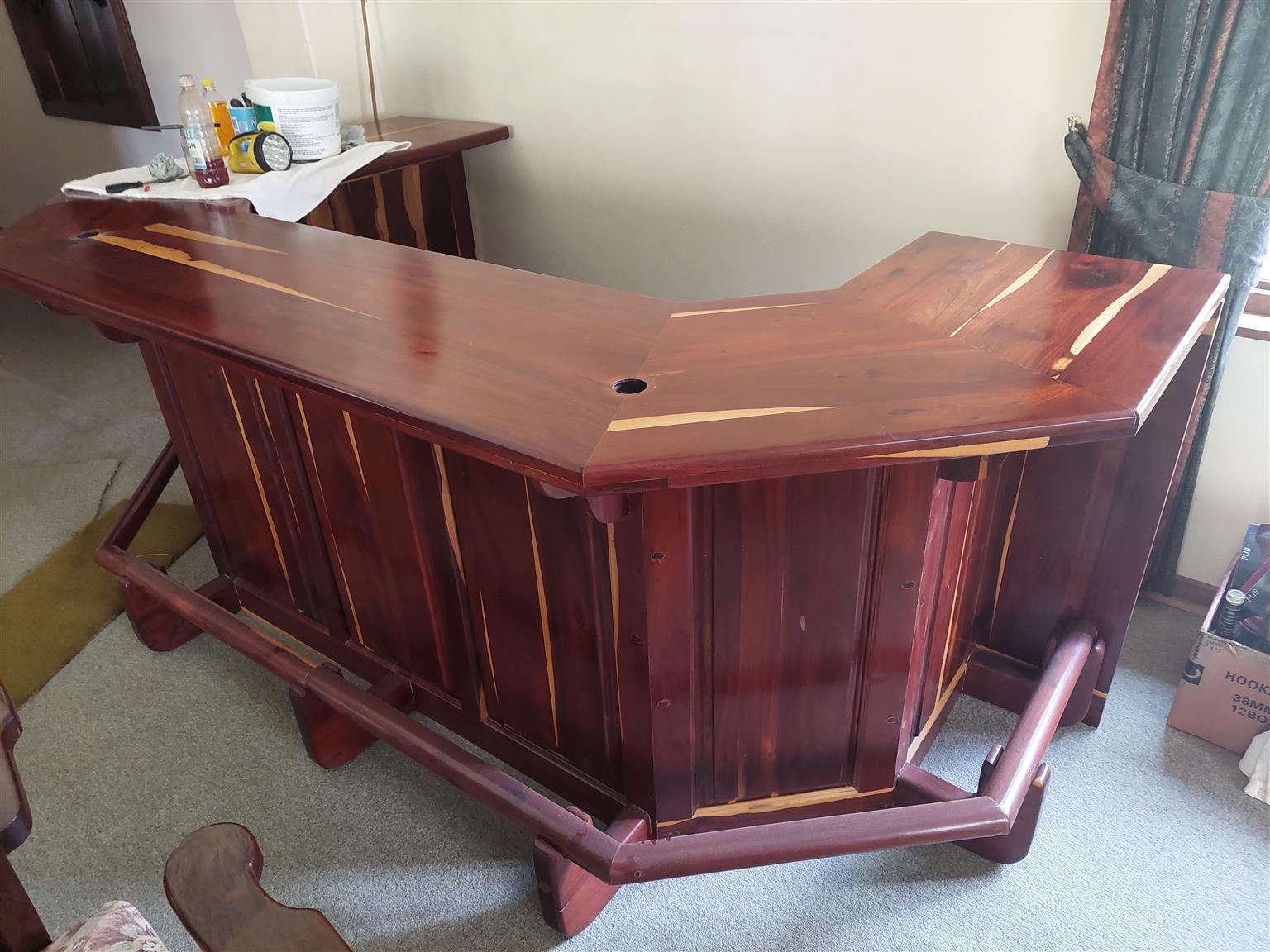Mopani wood Bar complete with cabinets below, foot rest, with Leadwood Stools to