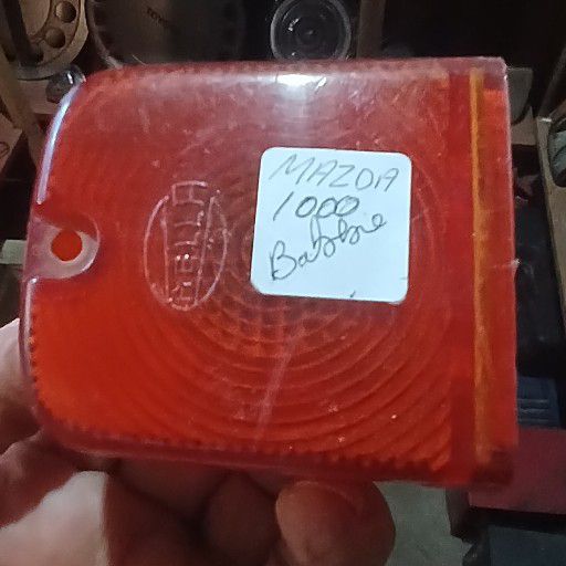 Mazda 1000, rear flicker lens - Private Seller