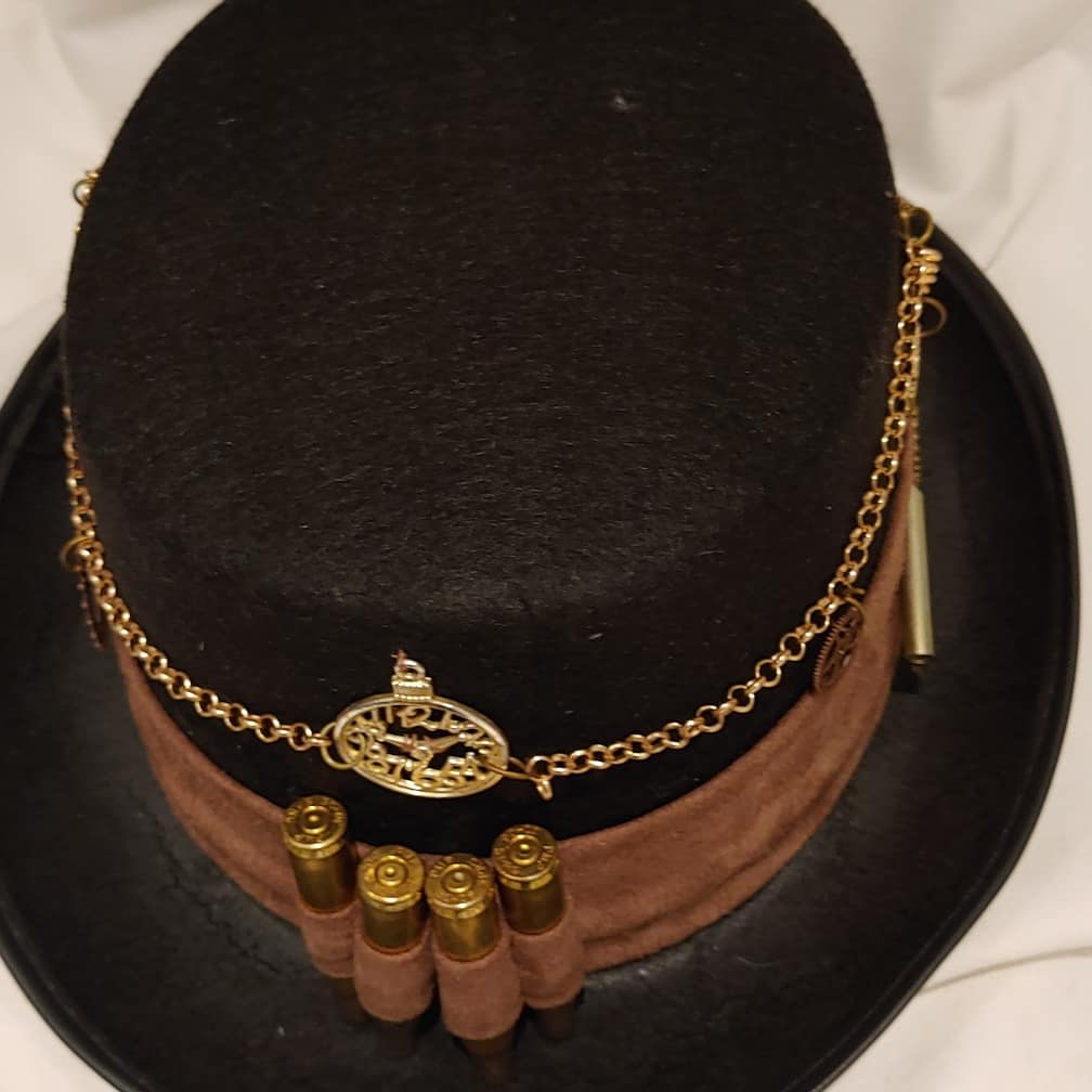 Steampunk tophats, copper Steampunk inspired canes , jewellery, goggles, faux leather bowties etc for Afrikaburn
