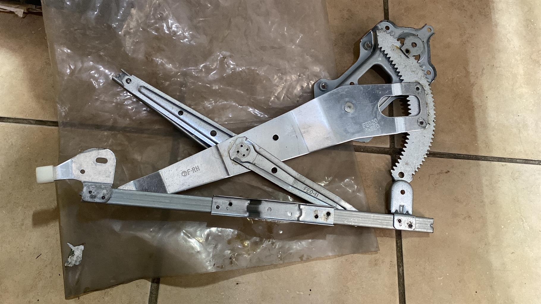 Subaru window regulator.