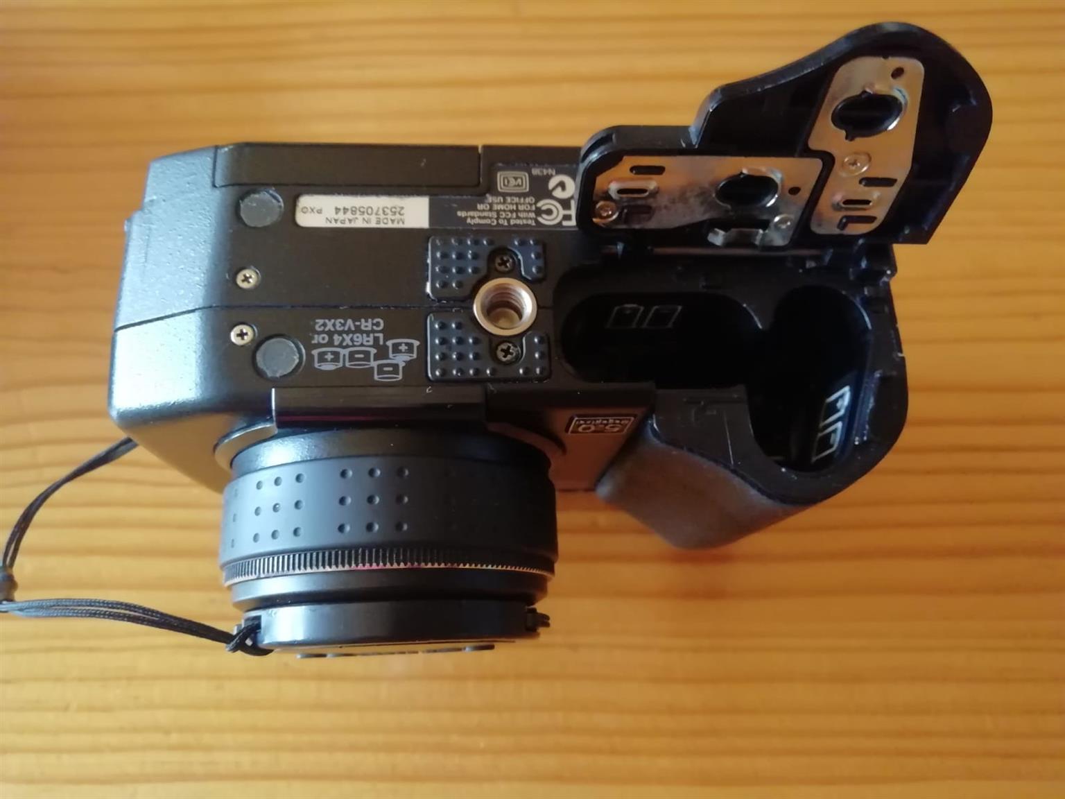Olympus Camedia Digital Camera C5050 5 MP = Battery Cover doesn't work/close