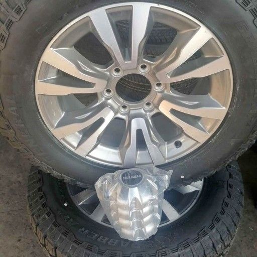 Isuzu silver rims and tyres