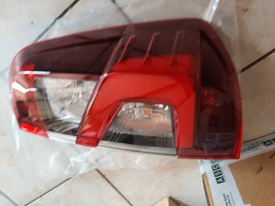 NISSAN NAVARA DOUBLE CAB TAIL LIGHTS. ORIGINAL. EACH. BRAND NEW. FOR VARIOUS OTHER CARS TOO - Private Seller