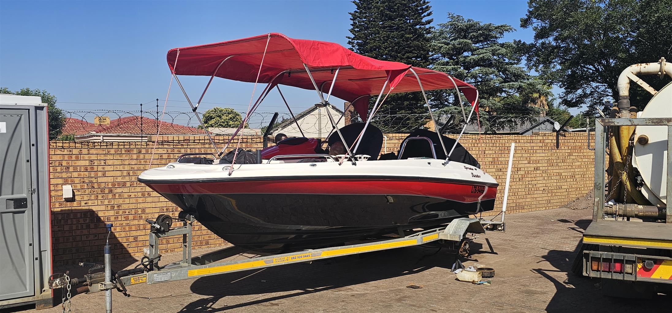 18 ft Exspression Funster boat with 150 Optimax Murcury Motor