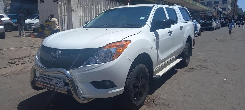 2014 MAZDA BT 50 2.5 PETROL, MANUAL TRANSMISSION, WHITE COLOUR, MILEAGE