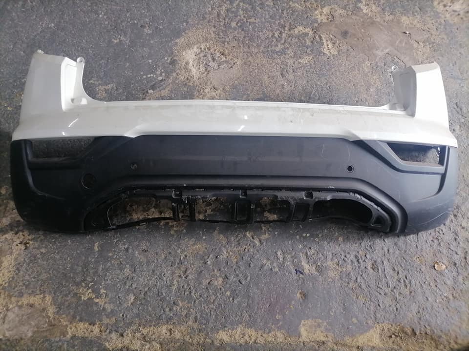 Mahindra XUV200 S200 white rear bumper DM or contact number in the description for assistance. - Private Seller