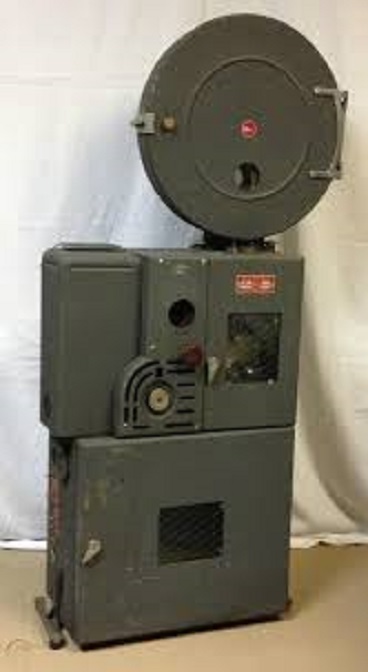 PORTABLE 35MM DEVRY FILM PROJECTOR FOR 