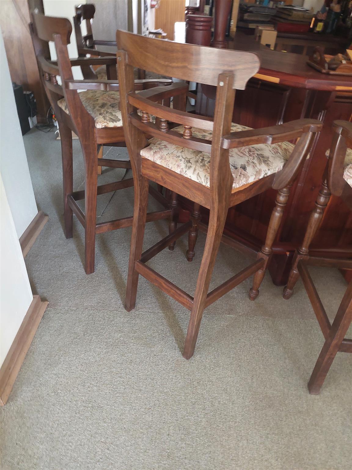 Mopani wood Bar complete with cabinets below, foot rest, with Leadwood Stools to