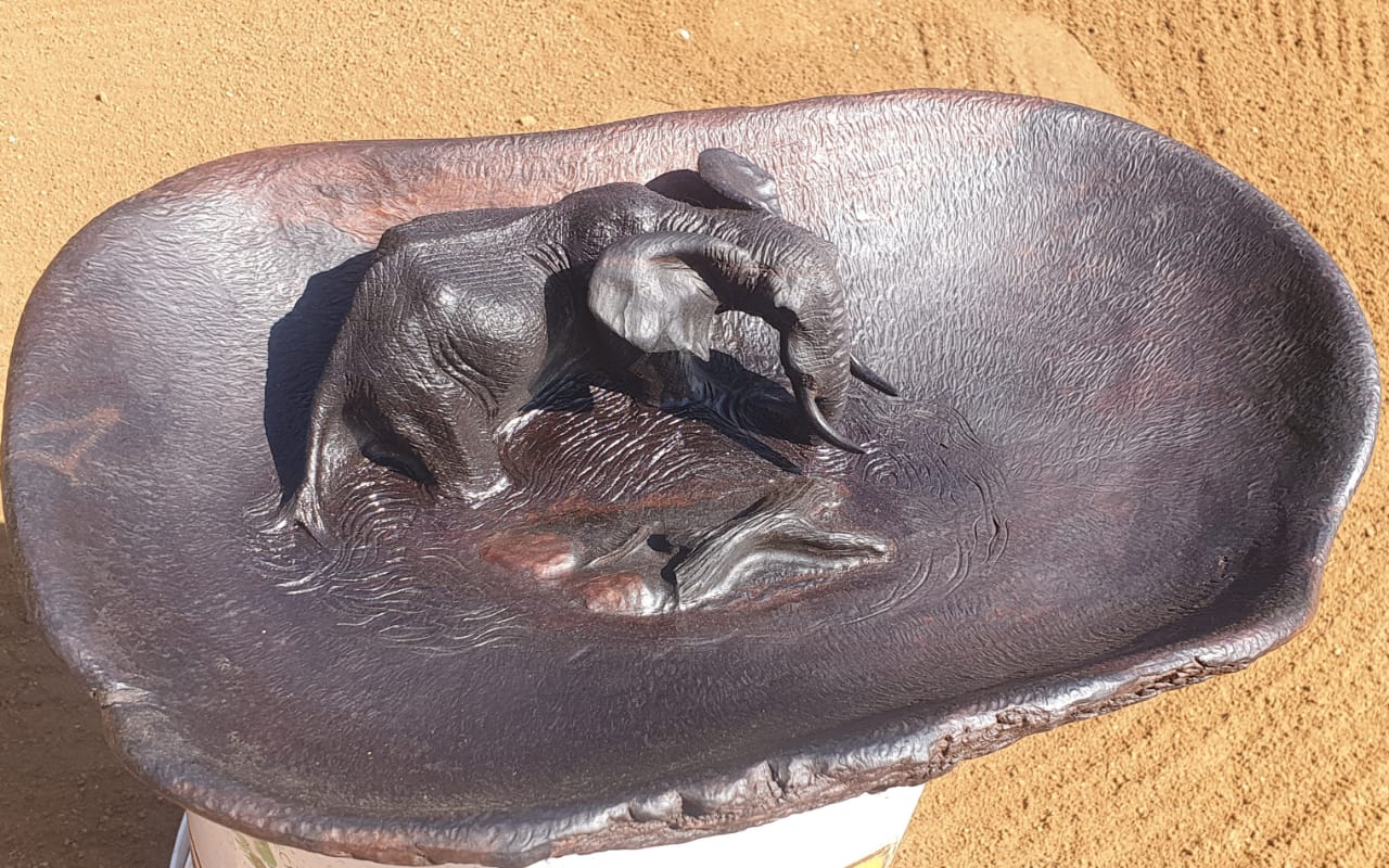 Fine art,wildlife carvings,on Ironwood