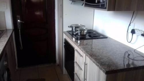 Two bedroom house to rent in Meadowlands with kitchen and bathroom, built in cupboards, secure parking, prepaid electricity, close to all amnesties and main roads. 
