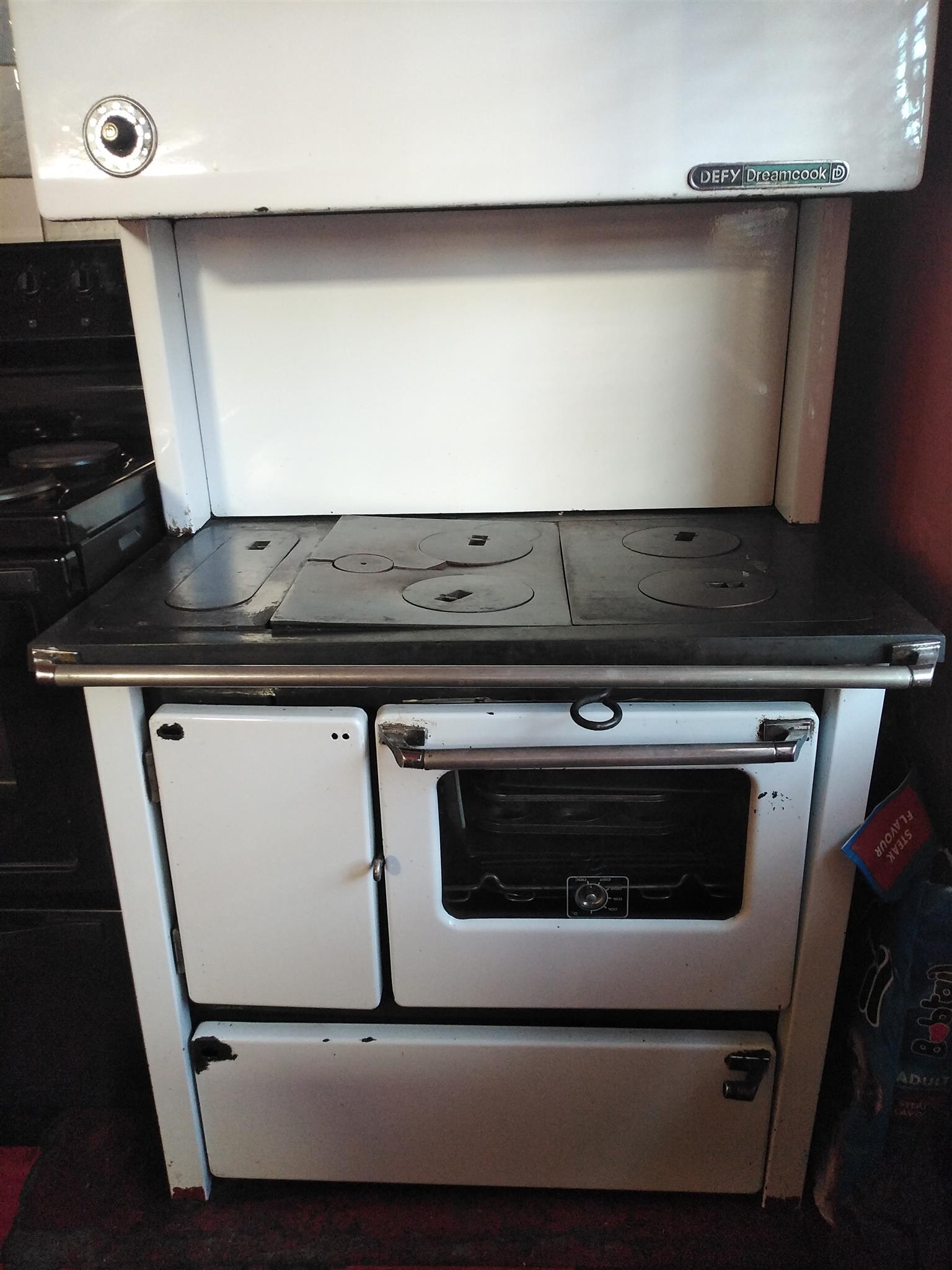 Antique Defy White Coal Stove just needs TLC taking up space.keeps warm in  the w | Junk Mail