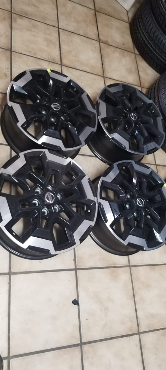 18 inch Nissan Navara original mags set - Private Seller 18 inch Nissan Navara original mags set - Private Seller