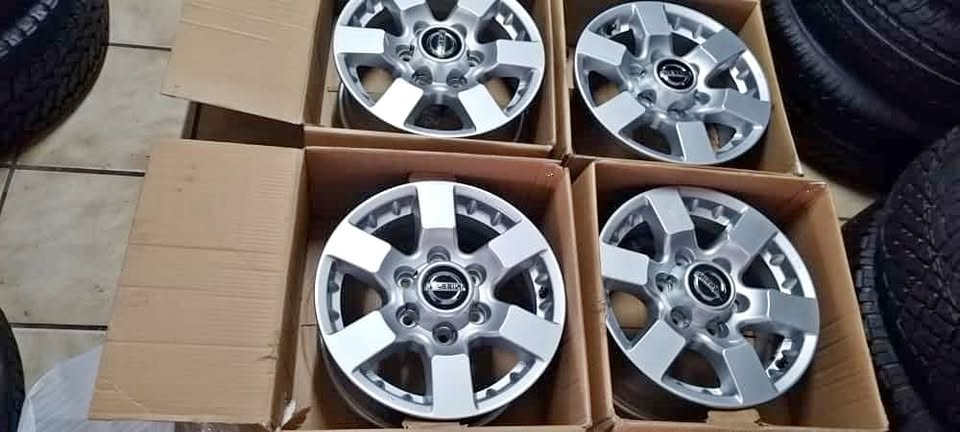 16" Nissan Hardboard/NP300 original mags with nuts set . - Private Seller 16" Nissan Hardboard/NP300 original mags with nuts set . - Private Seller