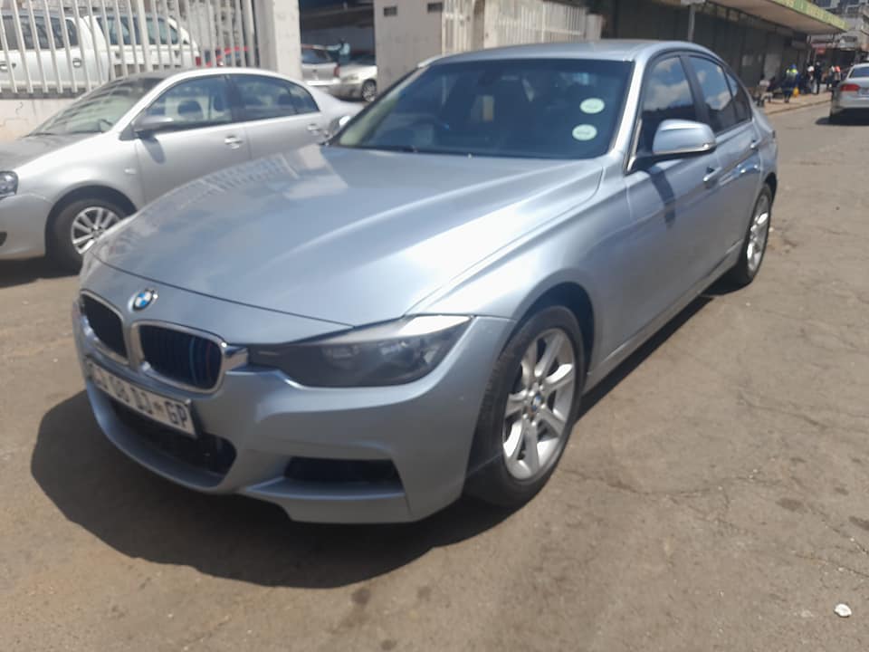 2013 BWM 3 series 320i Manual  Available Call Leon on