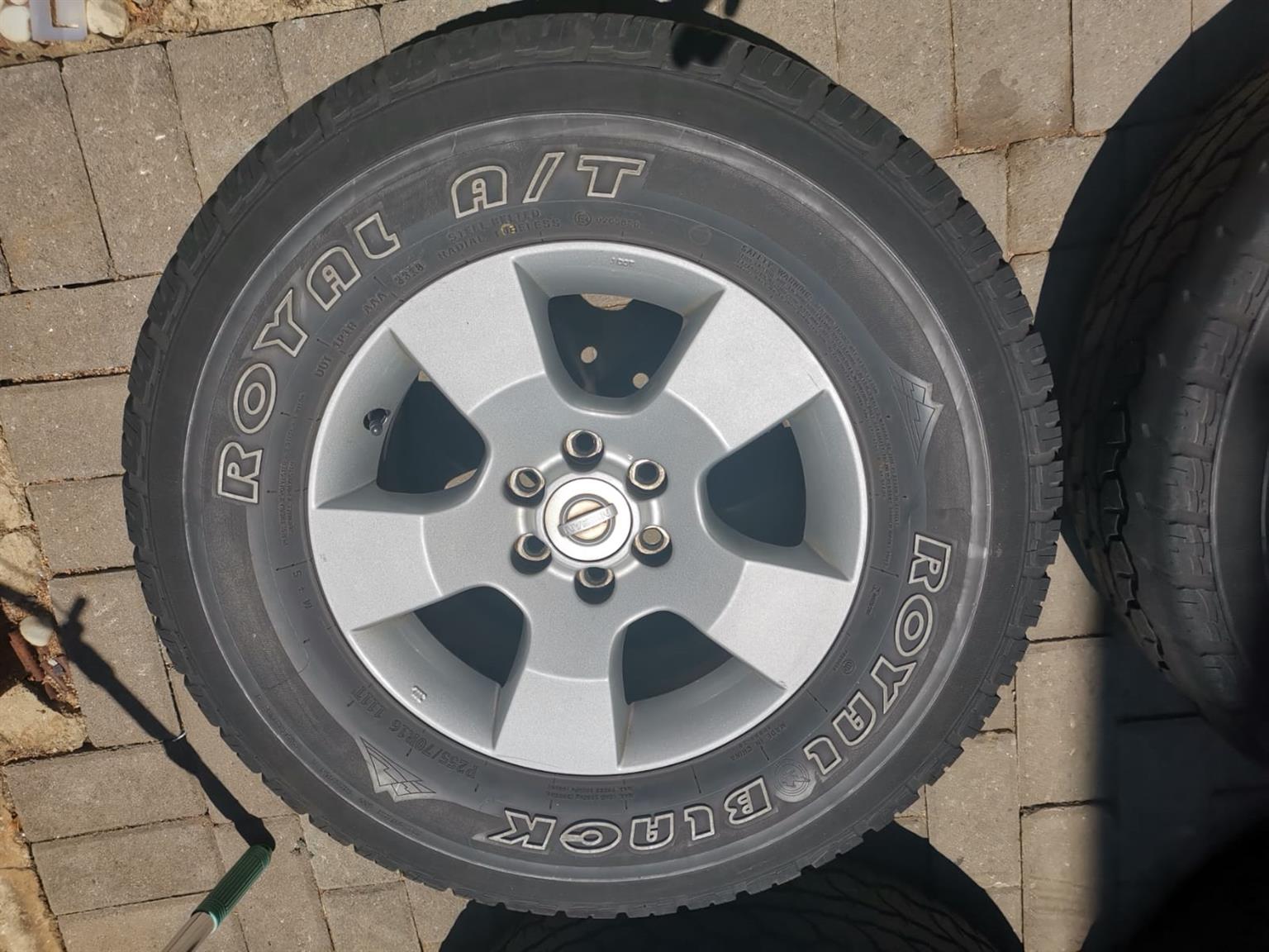 16 inch Nissan Navara original mags with used 255/70/16 Royal Black A/T tyres se - Private Seller 16 inch Nissan Navara original mags with used 255/70/16 Royal Black A/T tyres se - Private Seller