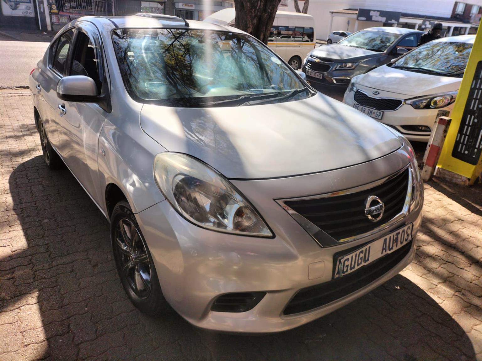 2015 Silver Nissan Almera sedan 1.5 Manual milage 86,000 km petrol