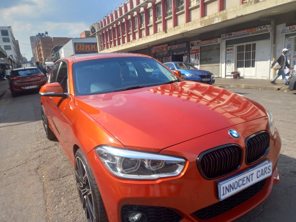 2017 BMW 120i MSPORT PETROL, AUTOMATIC TRANSMISSION, ORANGE COLOUR