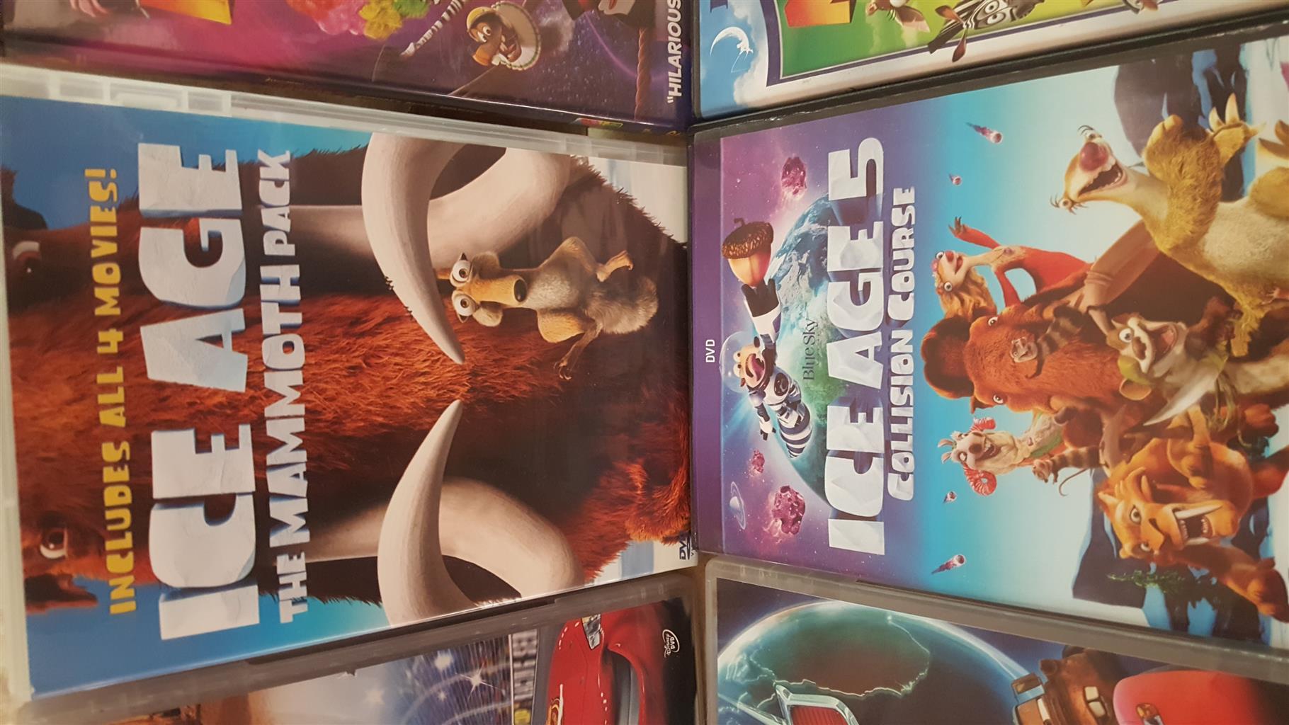 Collection of 14 children's dvds in as new condition.  Includes Ice Age Mammoth Pack, 2 x Cars, etc