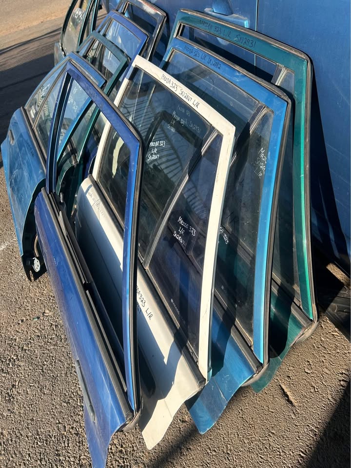Mazda 323 Left Rear Doors For Sale Call or Whatsapp
