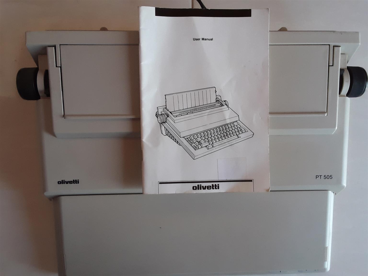 Olivetti PT505 Electric Typewriter with User Manual and new Ribbon. Working perfectly. 