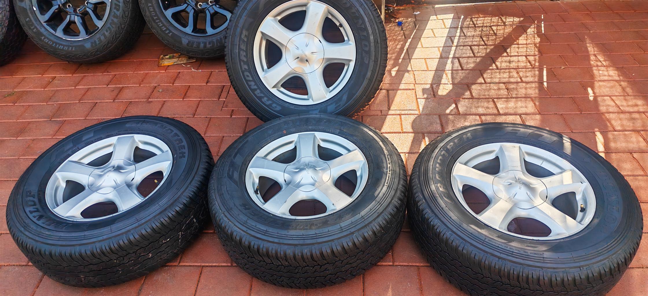 Isuzu wheels with dunlop grandtrek AT25 - Private Seller Isuzu wheels with dunlop grandtrek AT25 - Private Seller