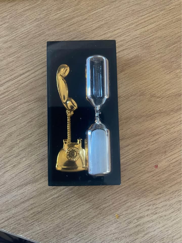 Vintage gold tone sand telephone timer Vintage gold tone sand telephone timer
