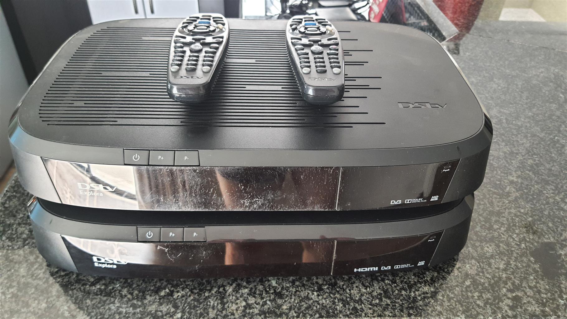 2 x DSTV explorer decoders  2 x Ellies remote blasters and 2 x DSTV WIFI connect