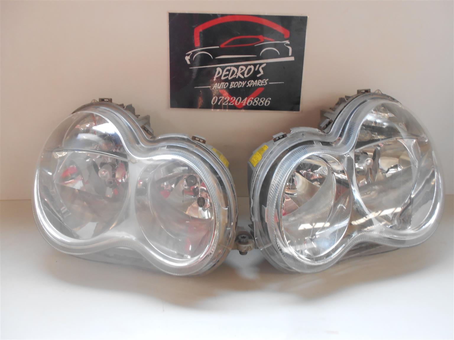 Merc W203 normal headlight set - Private Seller Merc W203 normal headlight set - Private Seller