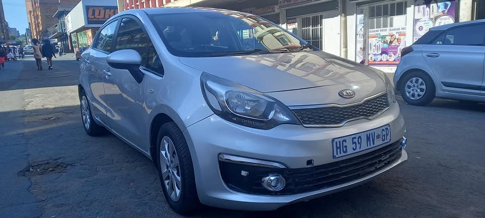 2015 KIA RIO 1.2 PETROL, MANUAL TRANSMISSION, SILVER COLOUR