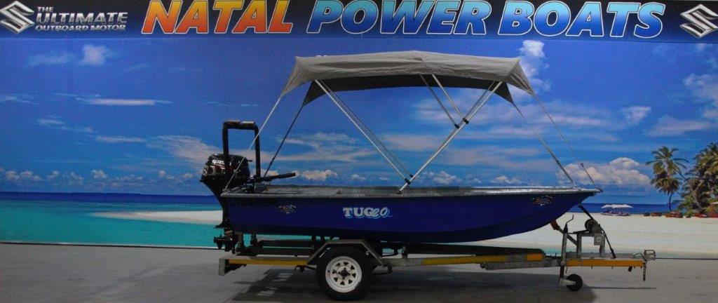 TUG 20 ON TRAILER 15 HP SUZUKI 4 STROKE TILLER
