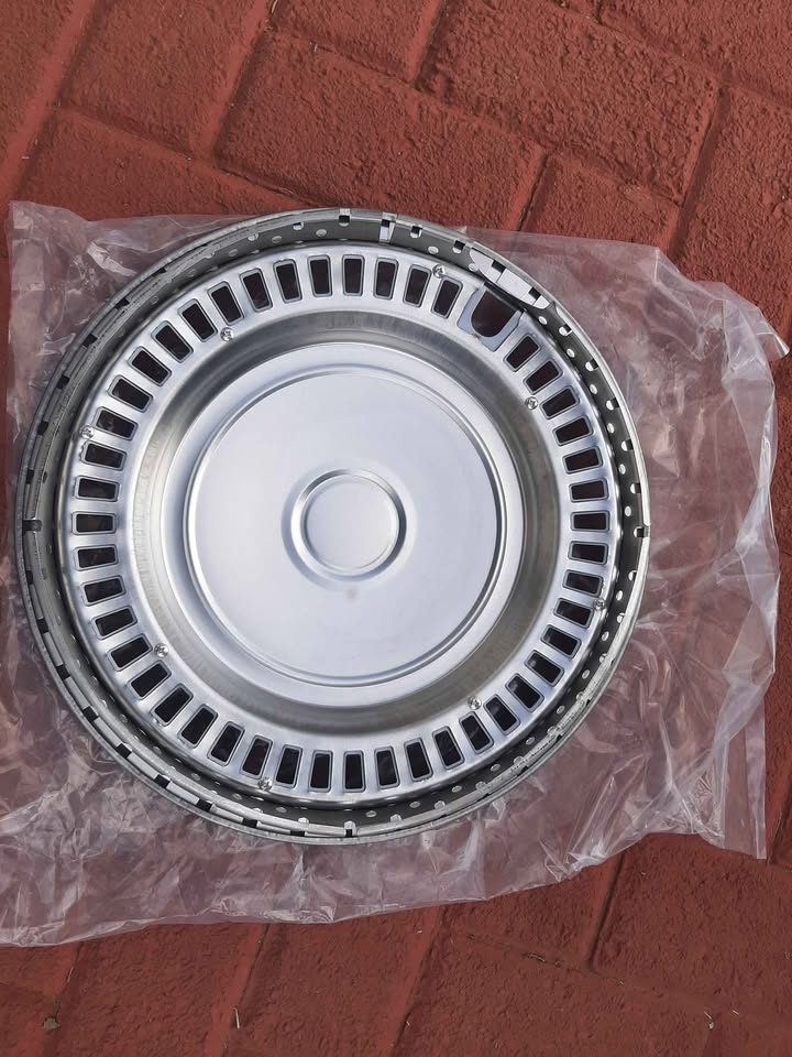 QUANTUM 14 INCH METAL WHEEL CAPS. BRAND NEW. FOR VARIOUS OTHER CARS TOO