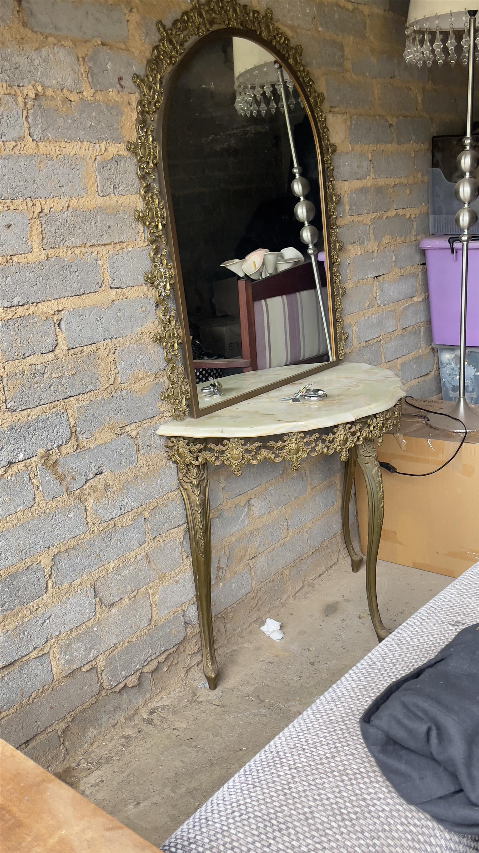 Stunning ornate moulded brass wall mirror and half moon marble table