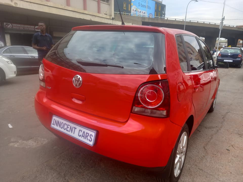 2012 VW POLO VIVO 1.4 TRENDLINE PETROL, RED COLOUR, MILEAGE . HAS SUNROOF.