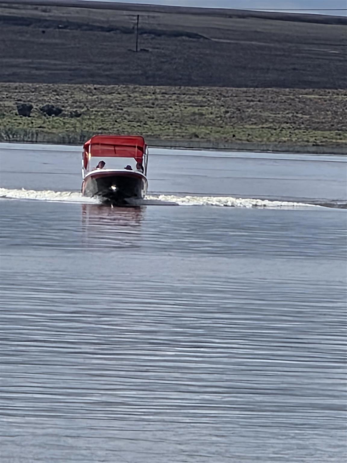 18 ft Exspression Funster boat with 150 Optimax Murcury Motor