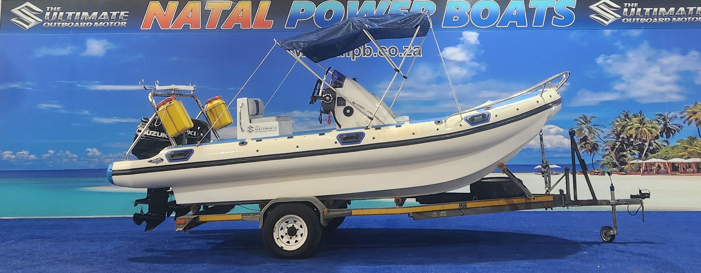 UNIQUE 575 RTB ON TRAILER 2 X 50 HP SUZUKI 4 STROKES UNIQUE 575 RTB ON TRAILER 2 X 50 HP SUZUKI 4 STROKES