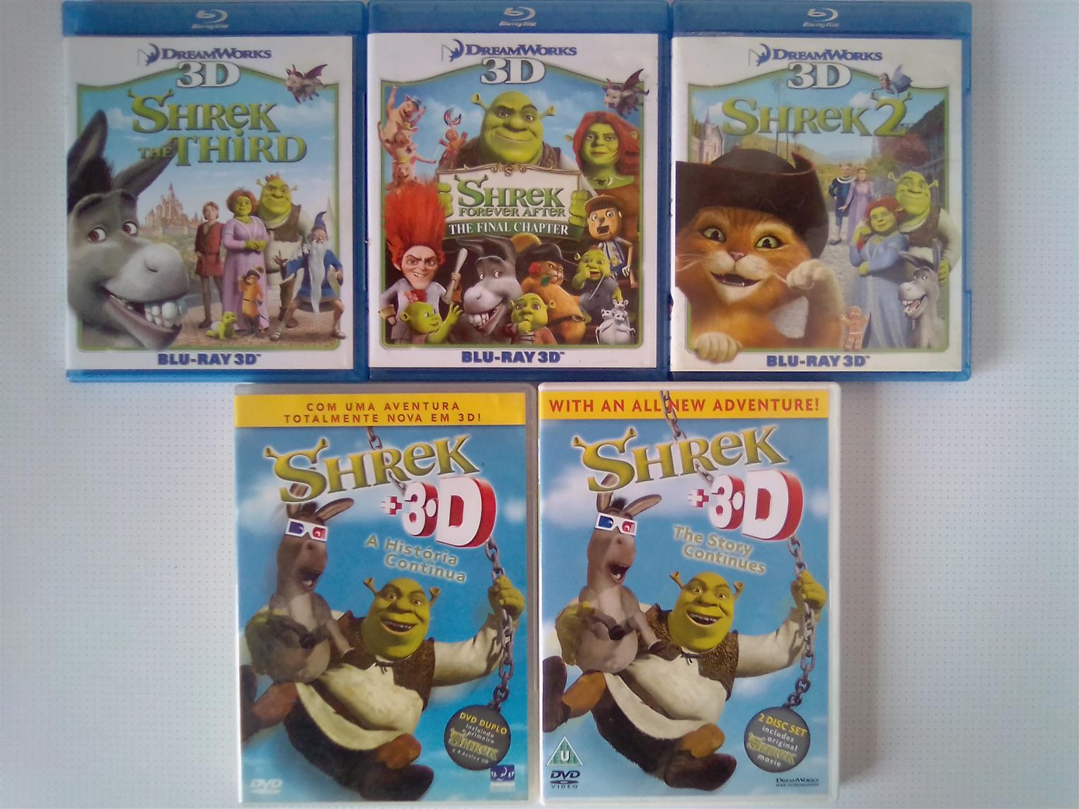 Shrek 3D Movies Collection. One Disc is in Portuguese, Spanish and English. Another box consists 3D and 2D Movies Shrek 3D Movies Collection. One Disc is in Portuguese, Spanish and English. Another box consists 3D and 2D Movies