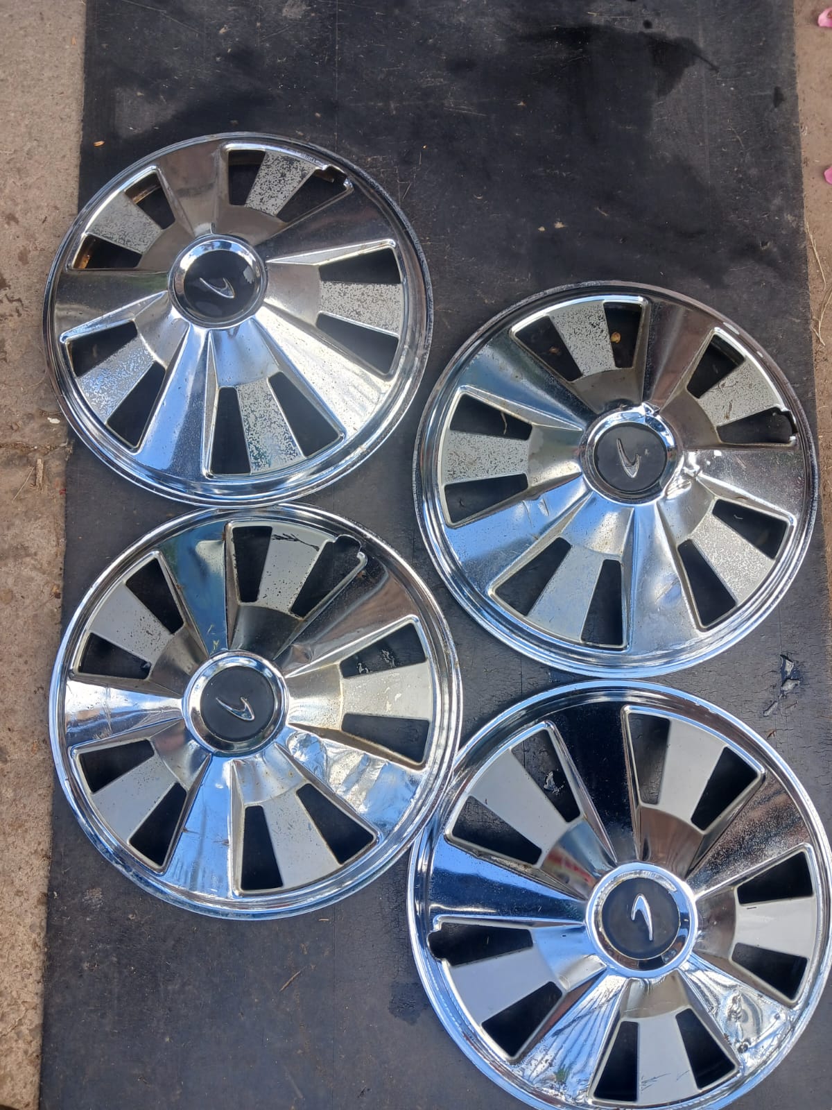 DATSUN 240C 260CSTEEL HUBCAPS. BLACK SILVER  CONTACT FOR PRICE - Private Seller