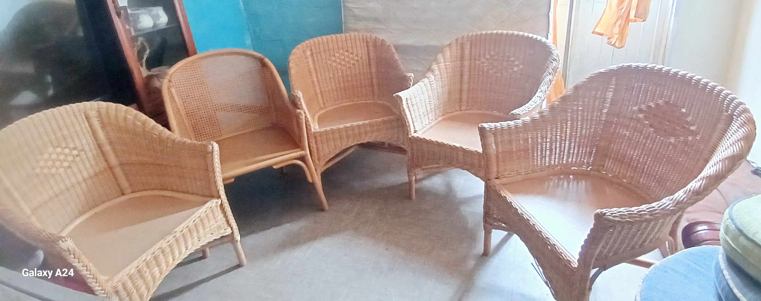 Vintage Cane wood double barrow chairs and glass top coffee table
