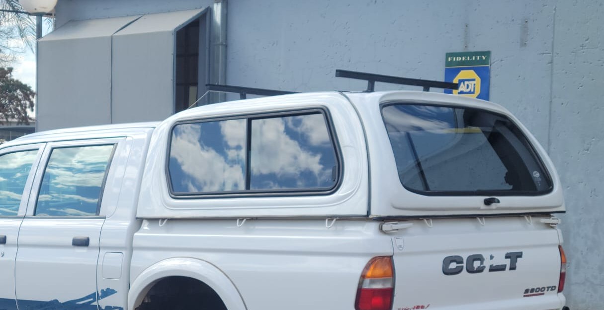 2000 Mitsubishi Colt d/k White Fibre glass canopy - Private Seller 2000 Mitsubishi Colt d/k White Fibre glass canopy - Private Seller