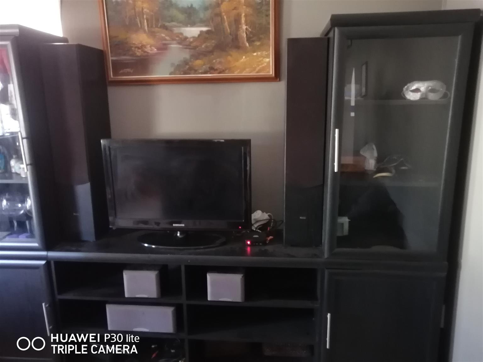 Wall unit with 3 Sony speakers and 2 TLS Reference speakers.