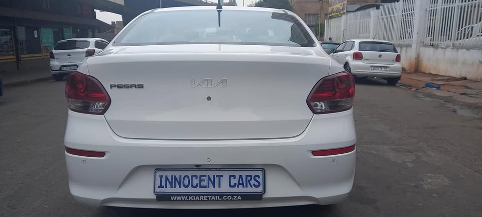 USED 2022 KIA PEGAS SEDAN 1.4 PETROL, MANUAL, WHITE COLOUR, MILEAGE 57000KM