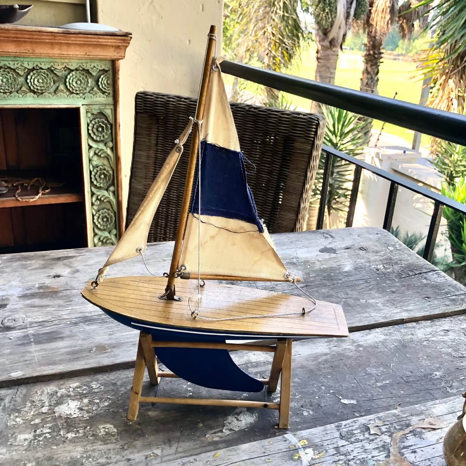 Vintage Decorative Sailing Boat on a wooden stand.