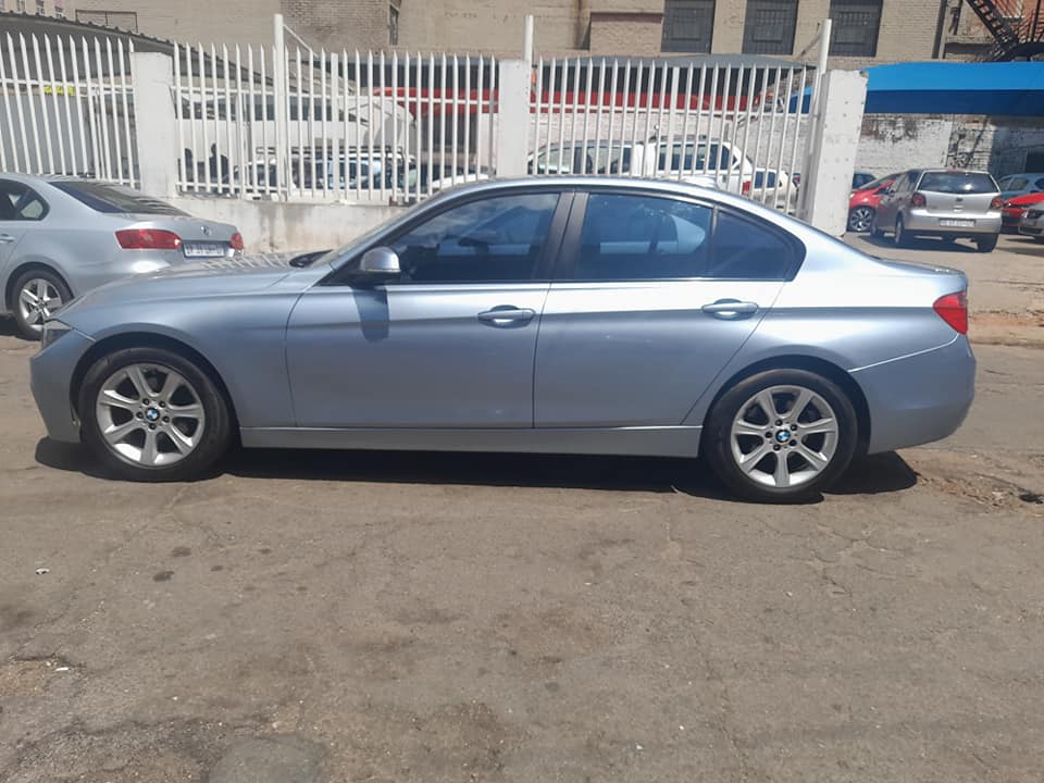 2013 BWM 3 series 320i Manual  Available Call Leon on