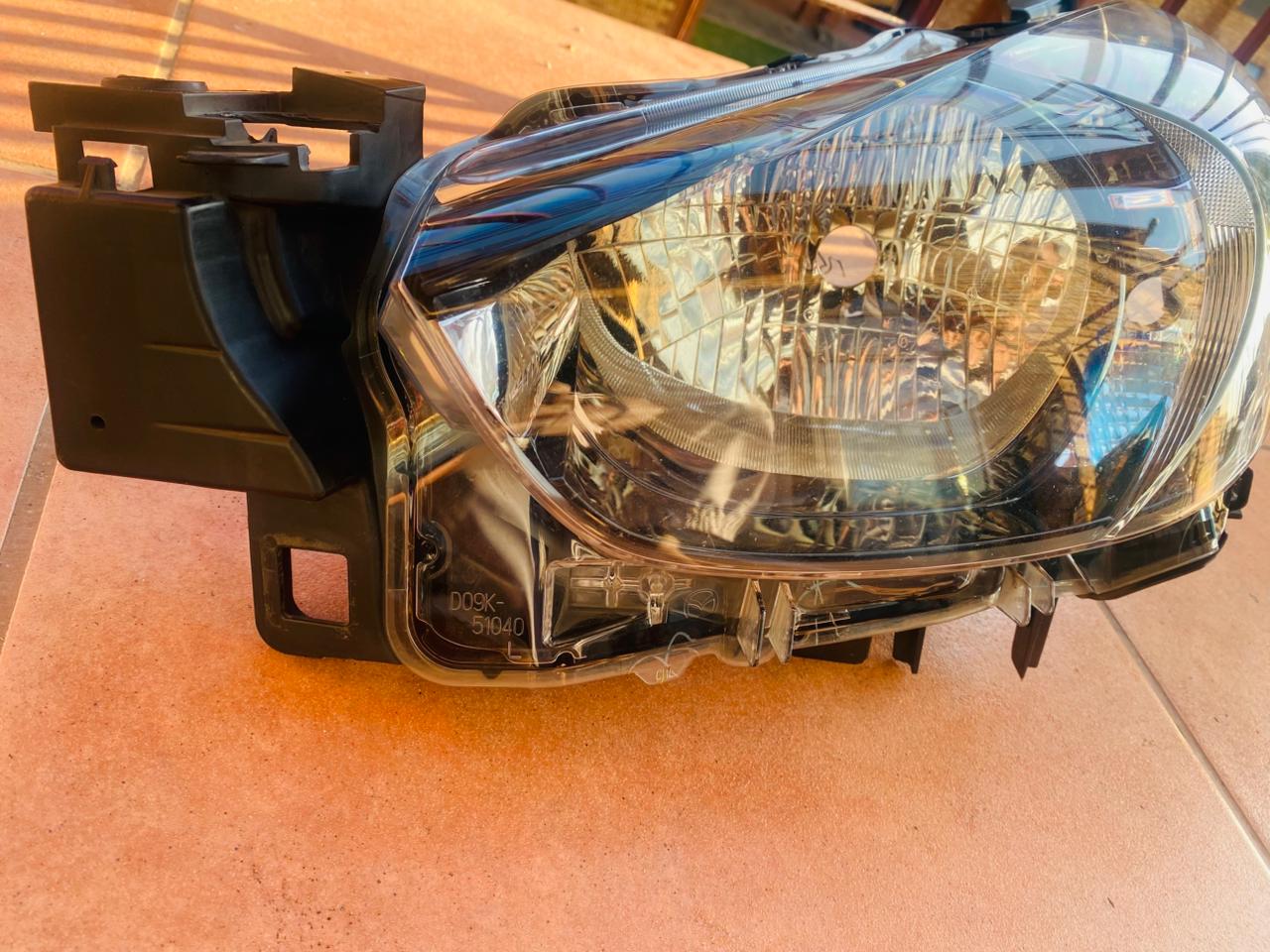 Mazda 2 left headlight for sale in good condition - Private Seller