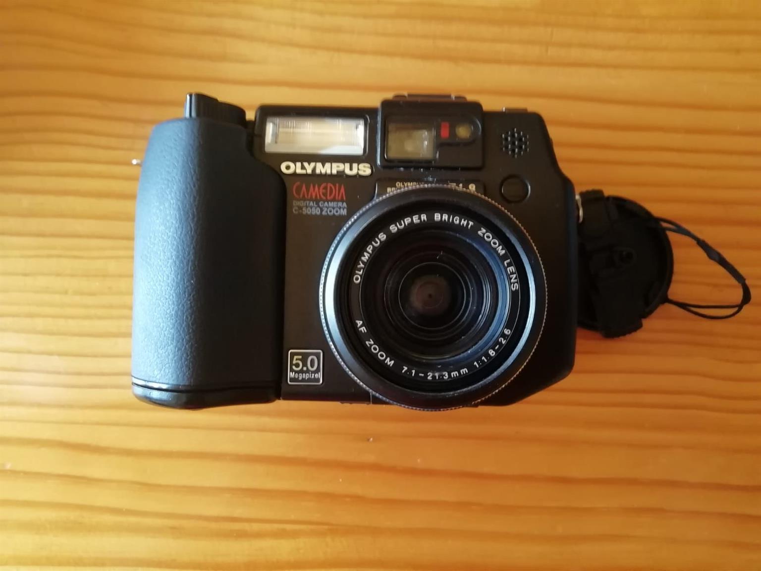 Olympus Camedia Digital Camera C5050 5 MP = Battery Cover doesn't work/close Olympus Camedia Digital Camera C5050 5 MP = Battery Cover doesn't work/close