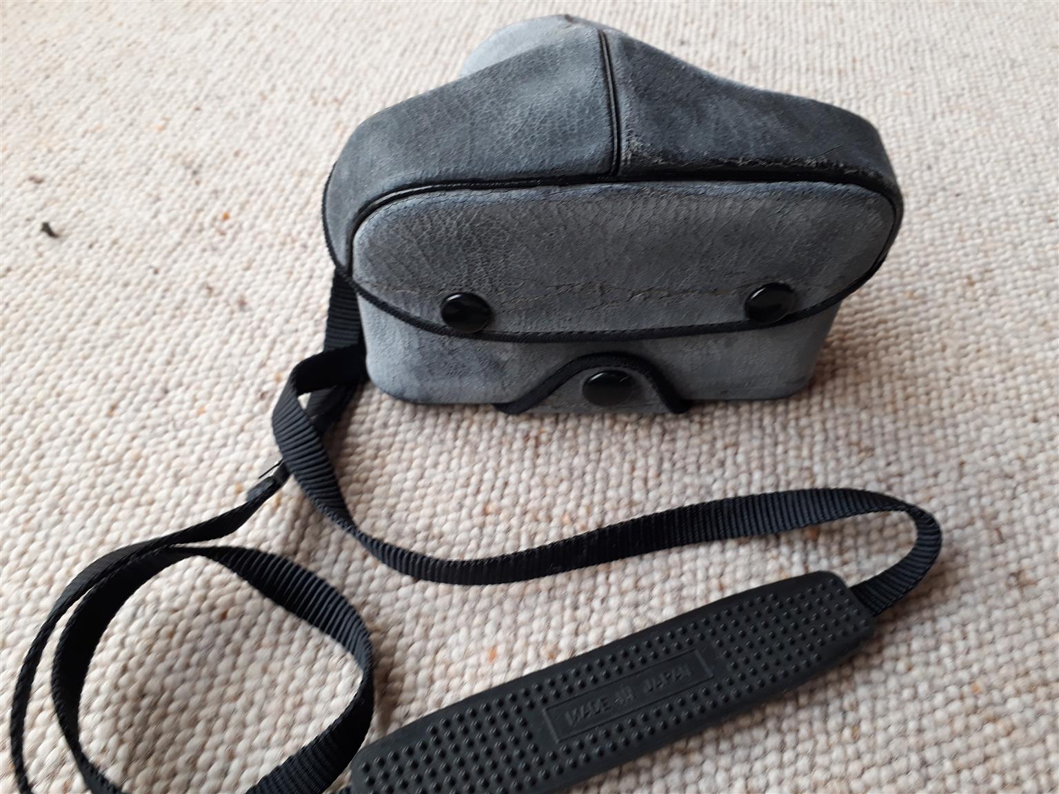 Pentax Asahi camera with flash and carry case