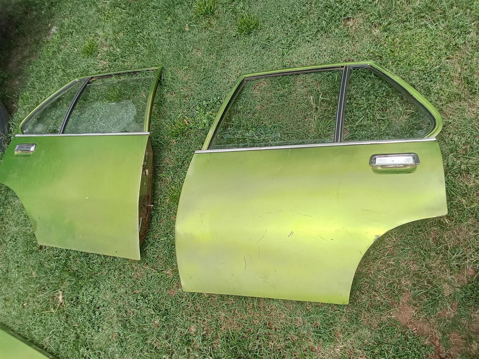 Chevrolet (2.5) left and right rear doors each complete - Private Seller Chevrolet (2.5) left and right rear doors each complete - Private Seller